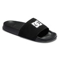 The Men's DC Slides by DC Shoes are black open-toe sandals with a wide strap featuring the white DC logo and star, plus a contoured footbed for comfort—ideal for casual wear or your gym bag.