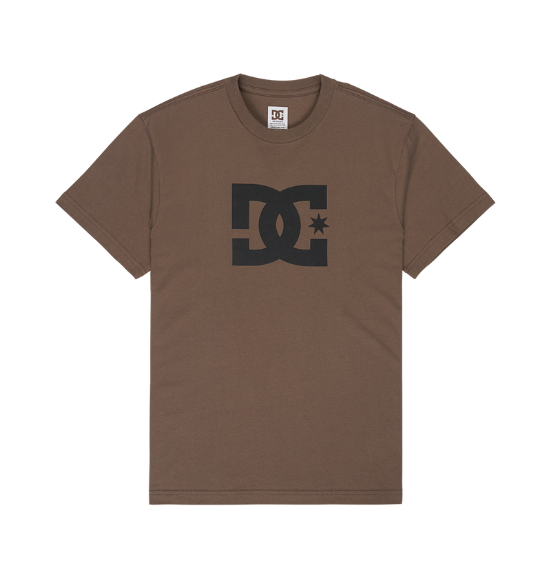 The Men's DC Star Tee by DC Shoes is a brown short-sleeve graphic skate shirt featuring a large black DC Shoes star logo at the chest. The relaxed fit tee is displayed flat on a plain white background.