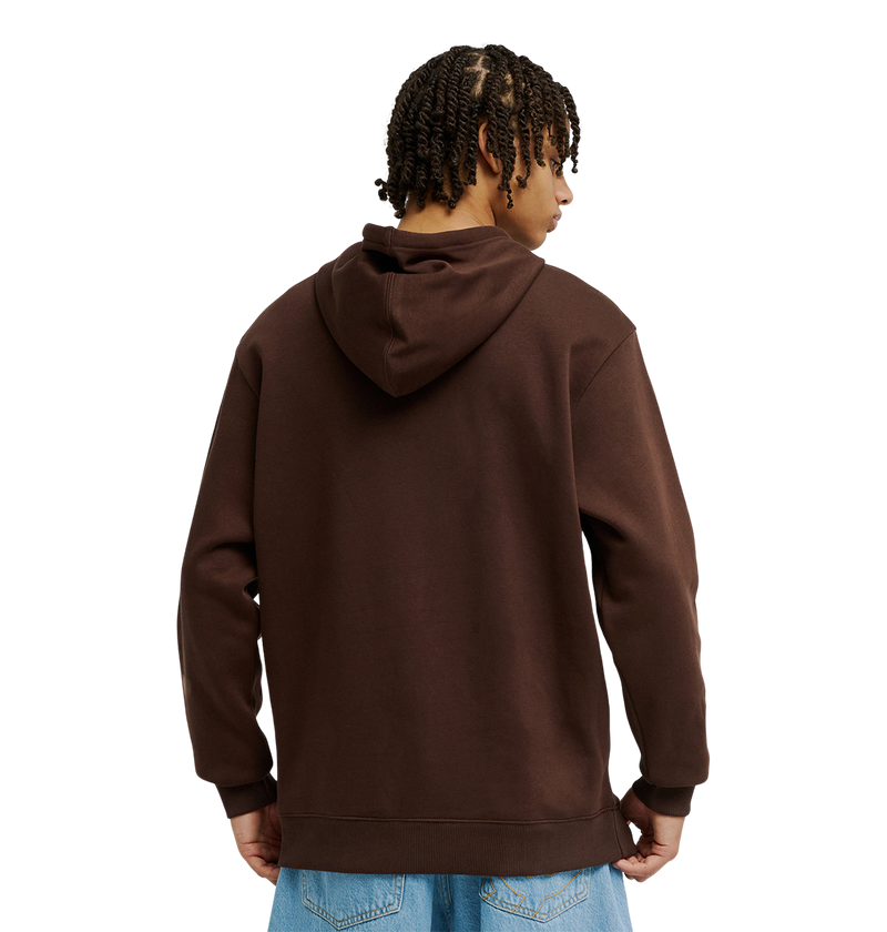 A person with short twists is seen from behind, wearing the Men's DC Star Hoodie by DC Shoes in brown and light blue jeans, set against a plain white background.