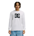 A person in the Men's DC Star Tee by DC Shoes—white with bold black DC graphics—stands against a plain white background, paired with light blue jeans. Ideal for casual hangouts or skate sessions.