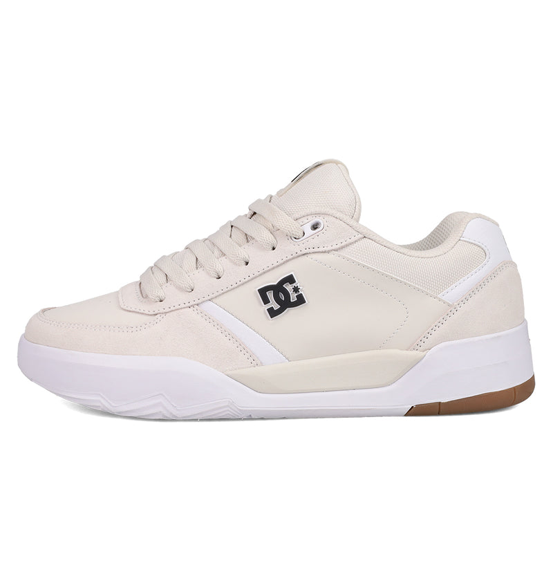 The Men's Fractal Shoes from DC Shoes feature a beige colorway with white accents, a lace-up design, the DC logo on the side, and a white rubber sole with a brown heel section for street-ready style and comfort.