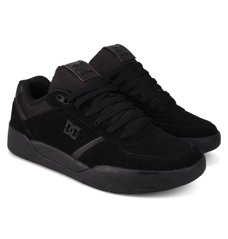 The DC Shoes Men's Fractal Shoes feature thick rubber soles, black laces, and DC branding on the side and tongue for street-ready style and comfort, displayed against a white background.