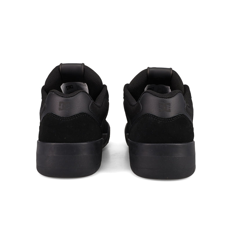 A pair of DC Shoes Men's Fractal Shoes in black shown from the back, highlighting padded collars and subtle heel logos—combining street-inspired style with performance comfort.