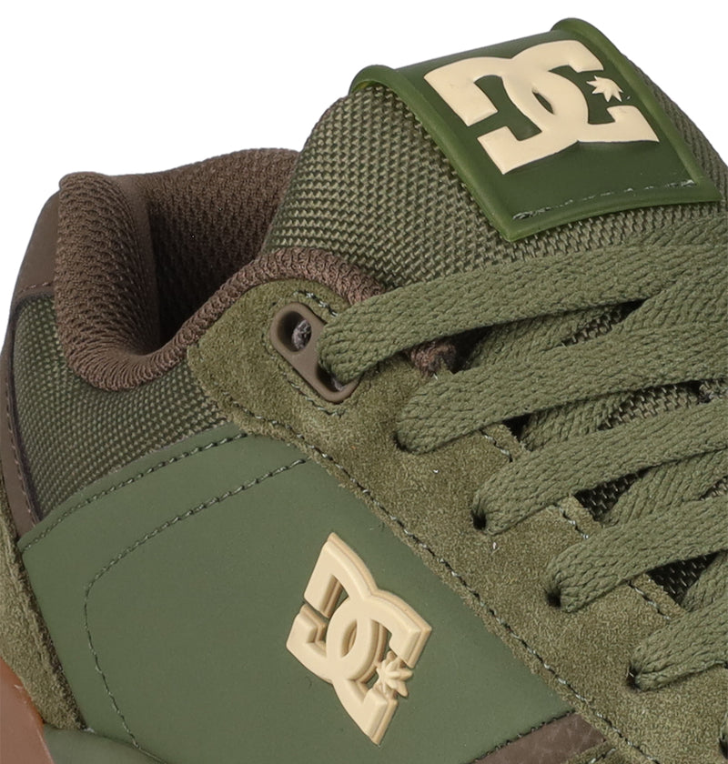 Close-up of DC Shoes Men's Fractal Shoes in olive green, highlighting textured laces, mesh tongue, and the cream DC logo—designed for street-ready style and all-day comfort.