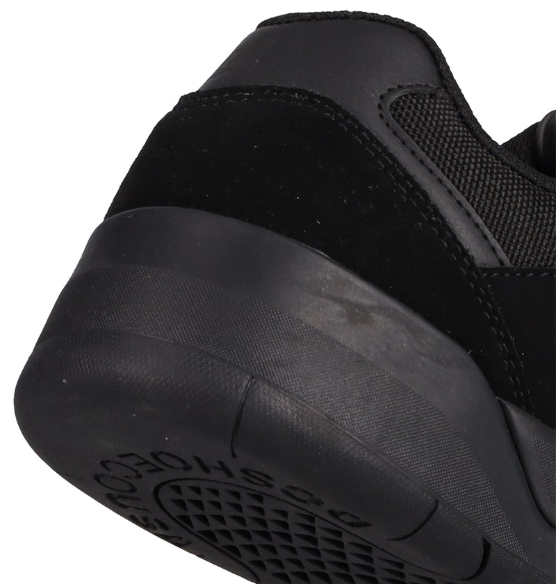 Close-up of the heel and sole of Men's Fractal Shoes by DC Shoes—textured rubber outsole, suede and mesh upper, visible stitching, and "ECO SHOE" embossed on the bottom—for fans seeking street-ready style and comfort.