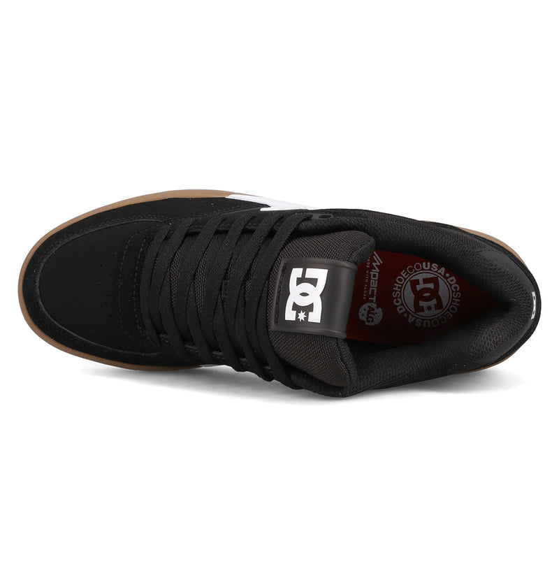 Top view of the Men’s Fractal S Shoes by DC Shoes featuring black laces, a white DC Shoes logo on the tongue, a brown outsole, and an insole with DC Shoes branding in white and red for a stylish, performance-driven fit.