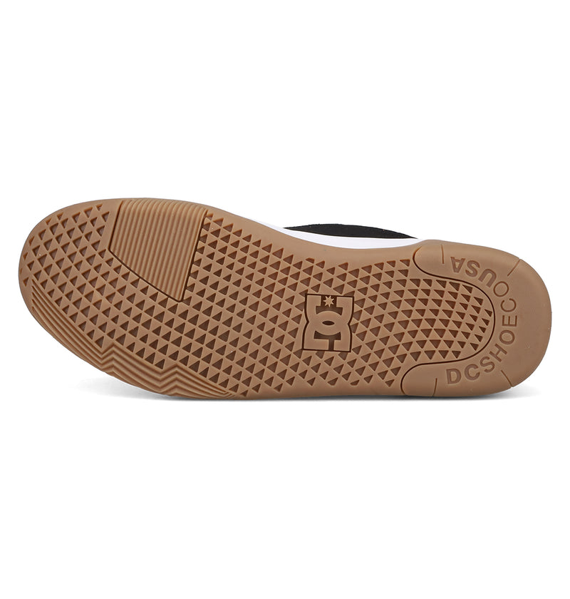 The image shows the Men's Fractal S Shoes by DC Shoes, featuring a brown rubber outsole with a textured grip pattern, the DC Shoes logo in the center, and "DC SHOE CO USA" near the heel.