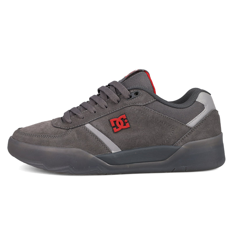 The DC Shoes Men's Fractal SE features a dark gray suede upper, gray laces, black rubber sole, red side DC logo, mesh ankle detailing, and a low-cut silhouette for standout street style and comfort.