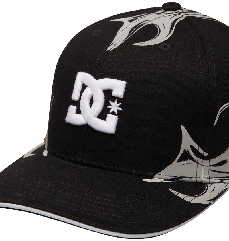 The Reebok Fuego Cap features a black design with a white logo on the front, gray abstract patterns on the brim and sides, and a white trim along the edge of the brim.