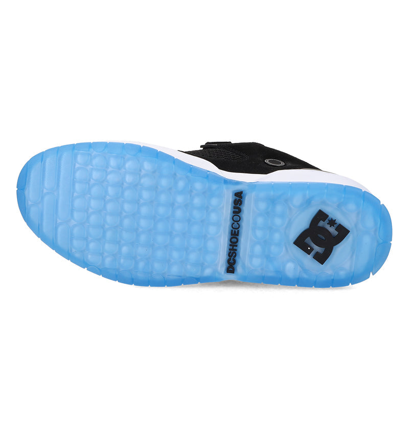 The underside of the Men's JS-1 Shanahan Pro Skate Shoes by DC Shoes has a translucent light blue sole with the DC Shoes logo and "DCSHOECOUSA" text.