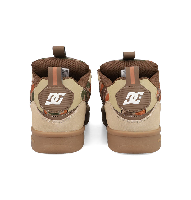 Back view of Men's JS 2 Shoes by DC Shoes, inspired by John Shanahan and DC heritage. Features beige suede, brown accents, side camouflage print, and white DC logo on the heels. Shown side by side against a white background.