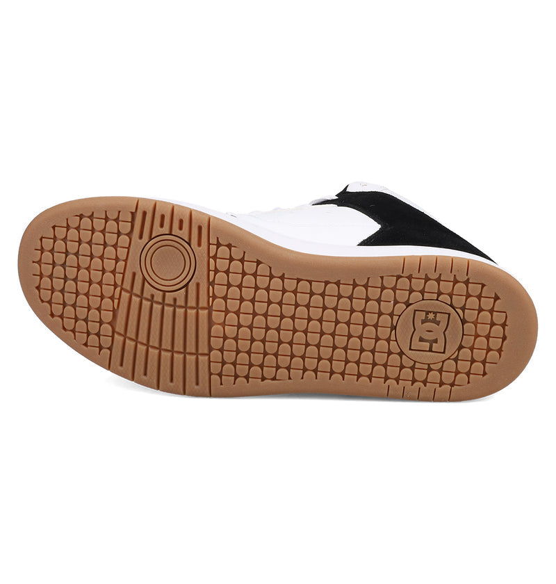 The Men's Manteca 4 Hi Shoes by DC Shoes are white high-top sneakers with black accents and gum soles, featuring a textured grip pattern and the DC logo for a blend of vintage style and modern design.