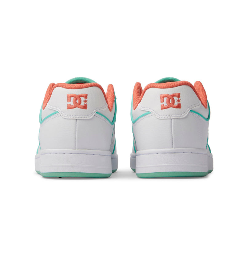 A pair of white DC Shoes Men's Manteca 4 SE with teal and coral accents, viewed from the back, display a performance design featuring the DC logo on the heels and a coral inner lining.