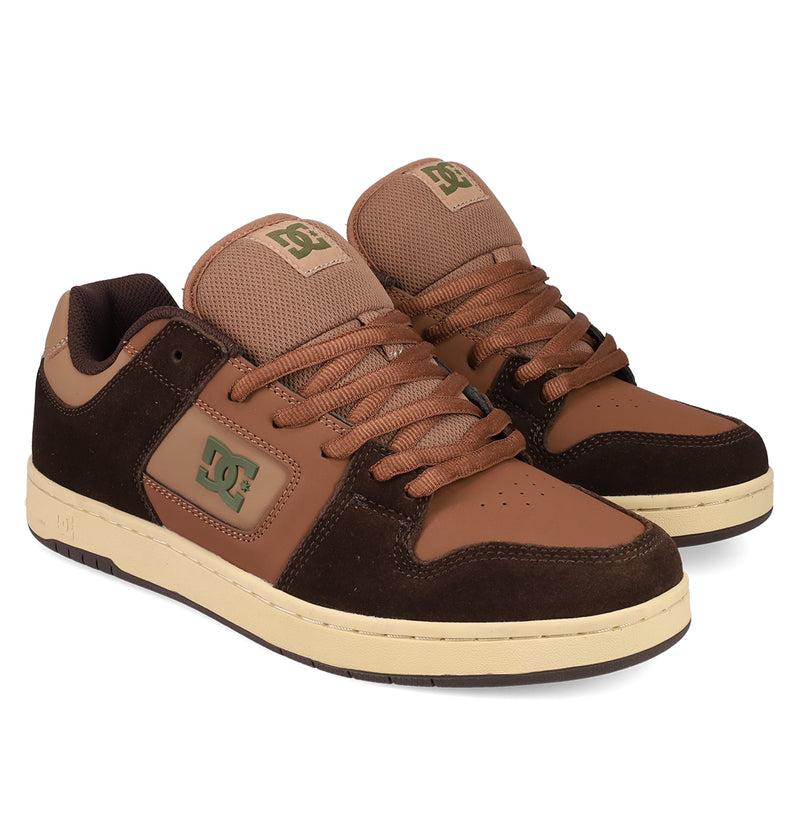 A pair of brown and tan Men's Manteca 4 DC Shoes with beige soles, crafted from suede and leather, featuring lace-up fronts and DC logos on the sides and tongue—iconic skate shoes for any collection.