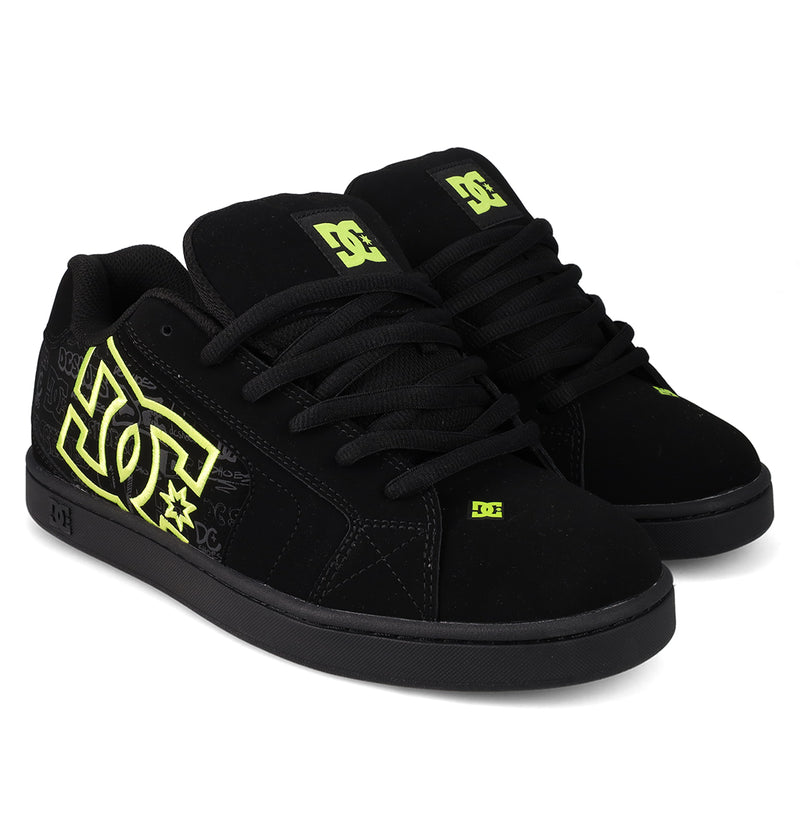 The Men's Net Shoes by DC Shoes are black skate sneakers with neon yellow logo details on the side, tongue, and laces. Featuring classic DC branding, these low-top, puffy shoes are made from durable fabrics for lasting comfort.