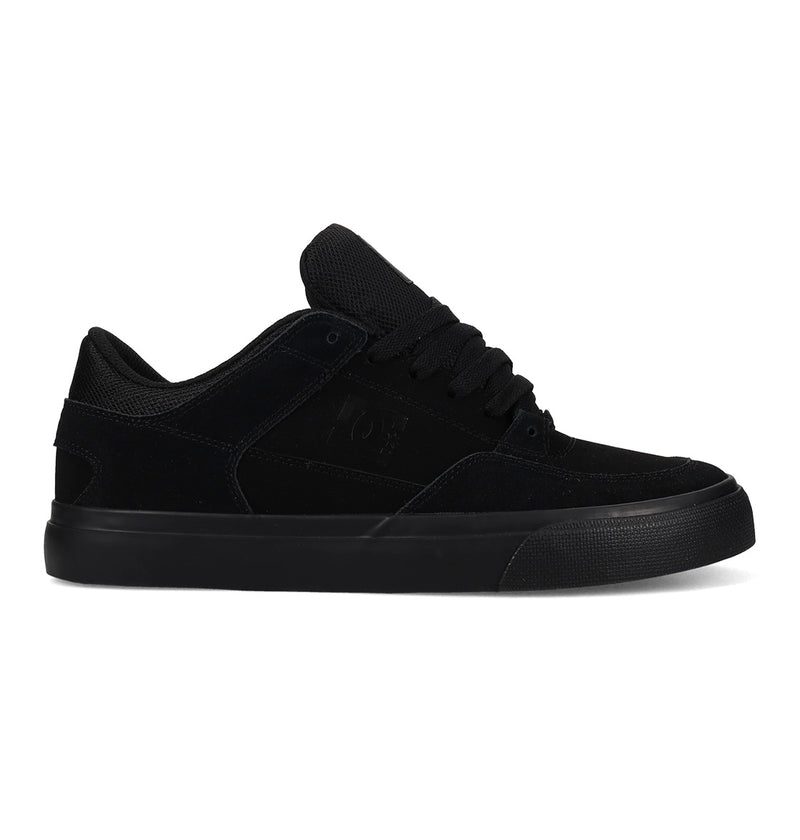 The Men's Onyx Shoes by DC Shoes feature a black low-top design with an Onyx suede and mesh upper, thick rubber sole, and black laces, displayed in side profile against a white background.