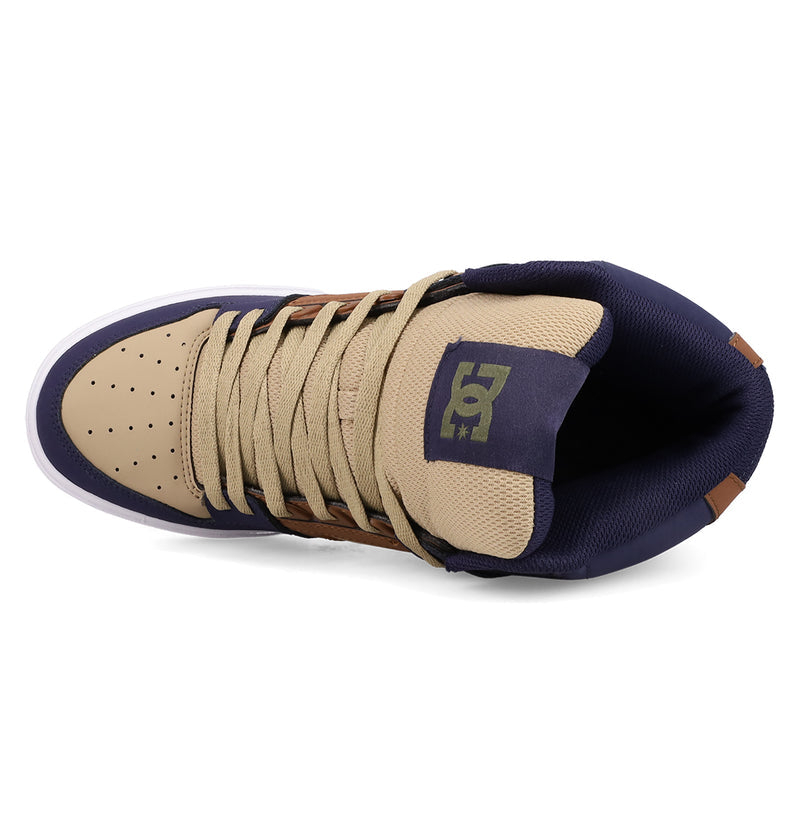 Top view of the Men's Pure High Top WC Shoes by DC Shoes, featuring beige and navy colors, tan laces, perforated toe box, padded ankle collar, and a vulcanized outsole for durable skate style.