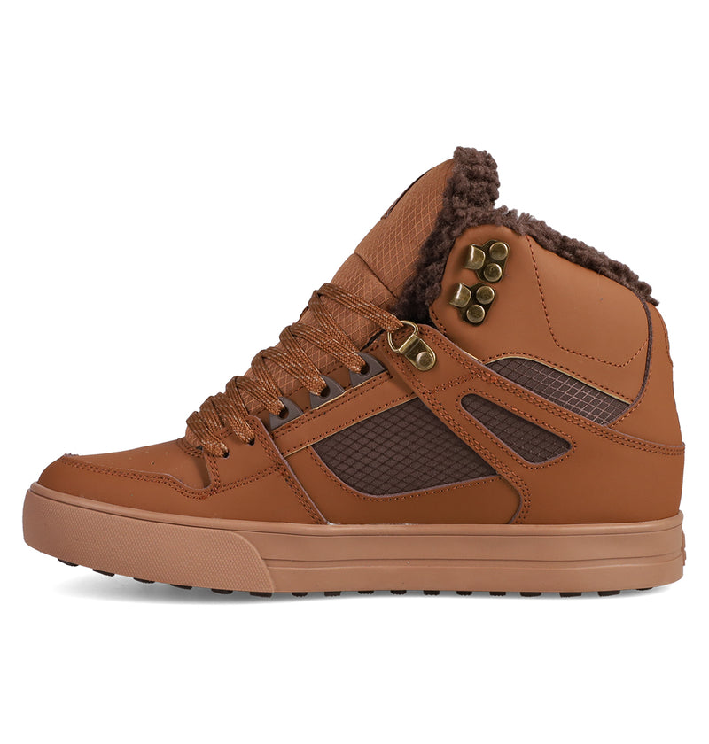 The Men's Pure High Top WC Shoes by DC Shoes feature brown faux fur lining, gold eyelets, and textured side panels. Inspired by DC skate shoes, they also have a patterned rubber sole for added warmth and style.