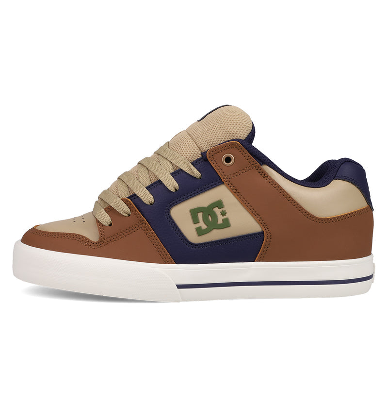 The Men's Pure Shoes by DC Shoes feature brown, beige, and navy blue colors with a white sole, beige laces, and a green DC logo—ideal for anyone seeking comfortable skate style.