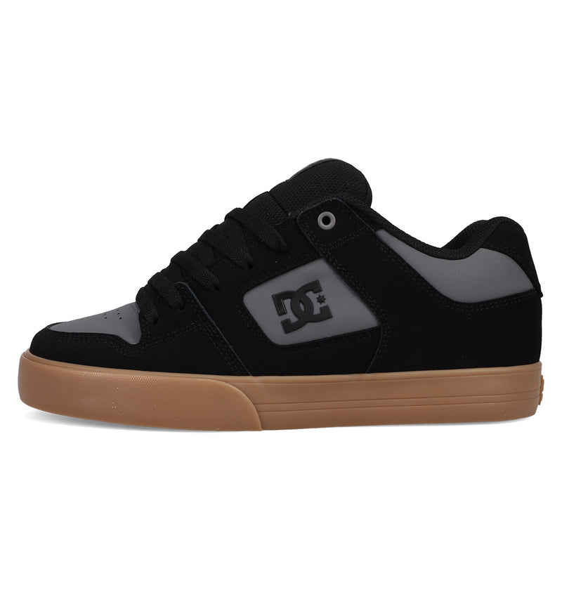 The Men's Pure Shoes by DC Shoes feature a black and gray design, gum rubber sole, DC logo on the side panel, and black laces—combining comfort with classic skate style.