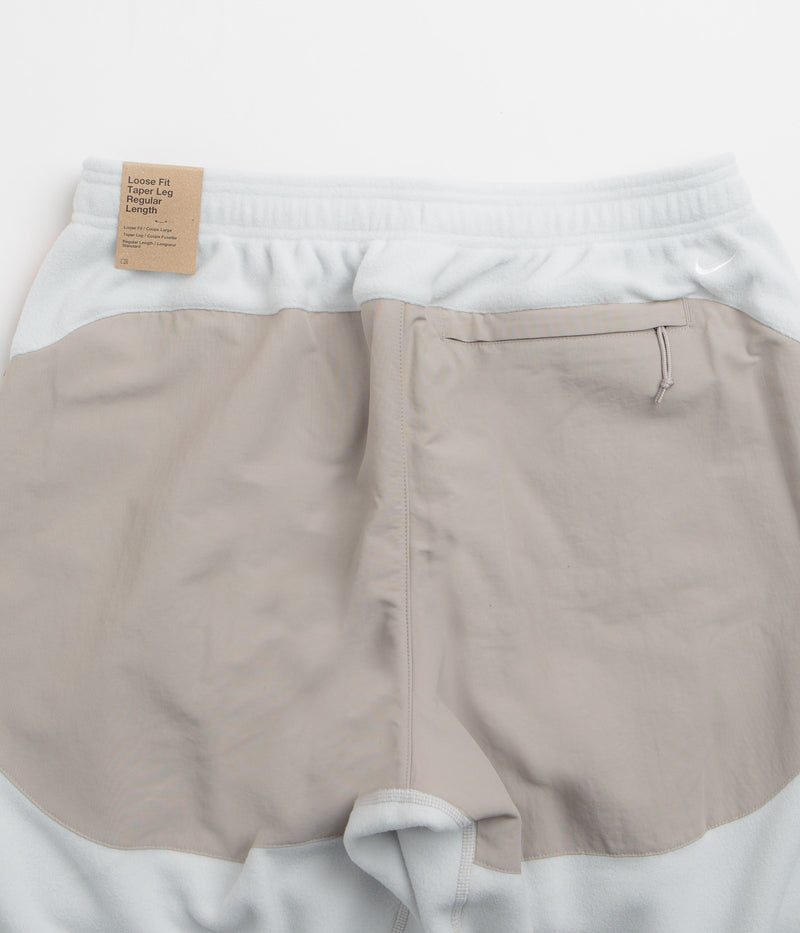 Nike ACG Wolf Tree Plus Pants in Photon Dust and College Grey / Summit White