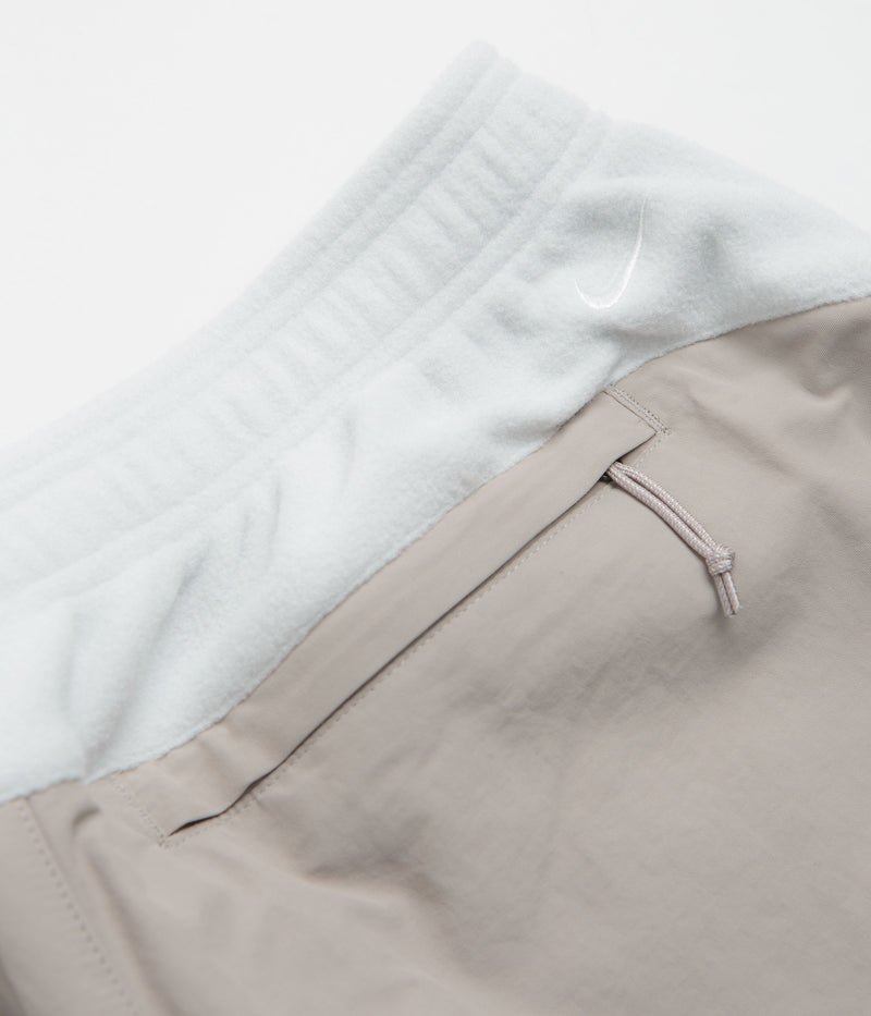Nike ACG Wolf Tree Plus Pants in Photon Dust and College Grey / Summit White
