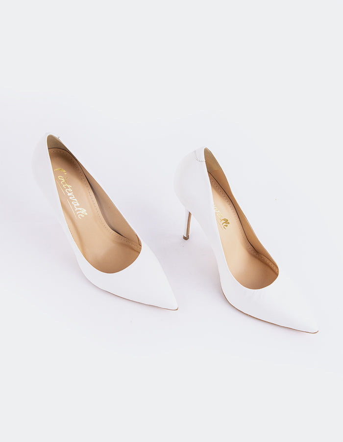 A classic&nbsp; pump is a timeless wardrobe essential.

Versatile enough to pair effortlessly with everything from long, oversized trousers to dresses or skirts, this pump can be dressed up or down with ease. Designed for maximum comfort, it allows you to stay relaxed and confident all day or night, no matter the occasion.

Detail(s):&nbsp;

Pointy Toe
4.25”&nbsp; Straight Stiletto Heel
We recommend sizing up, as this item runs small.

Material(s):&nbsp;

Genuine Leather Upper&nbsp;
Padded Leather Insole
Ma