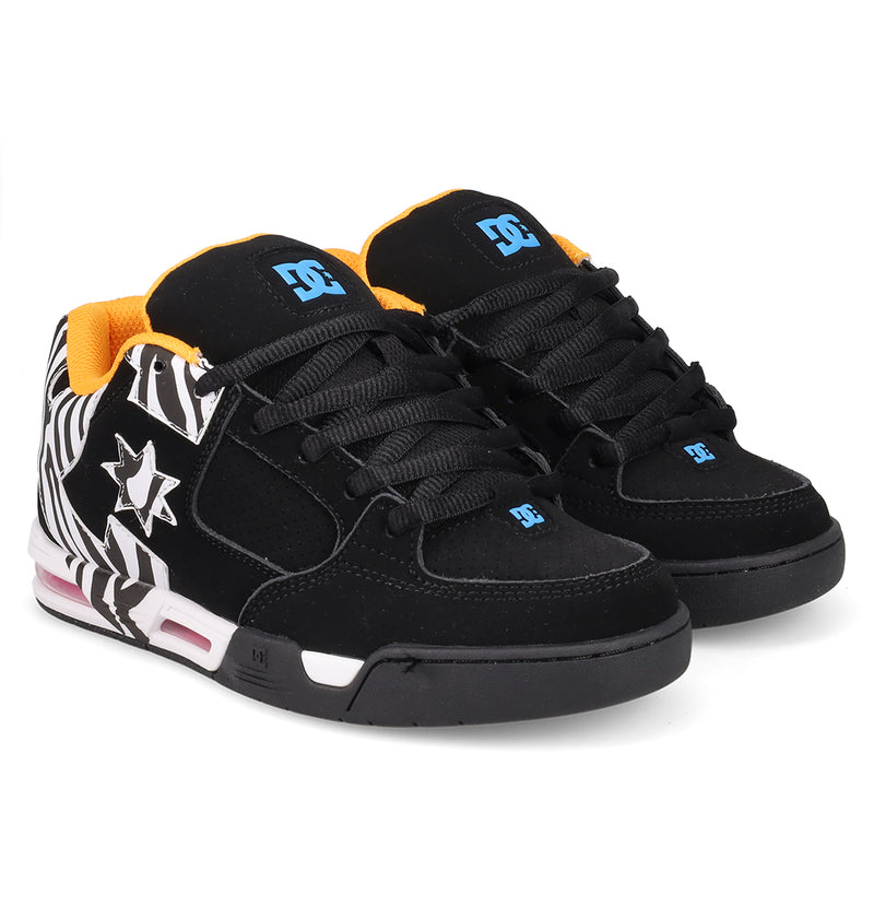 The Women's DC Command Shoes by DC Shoes feature black uppers with orange lining, blue logos, black laces, and bold white-and-black zebra print and star designs on the sides for classic skate-inspired street style.