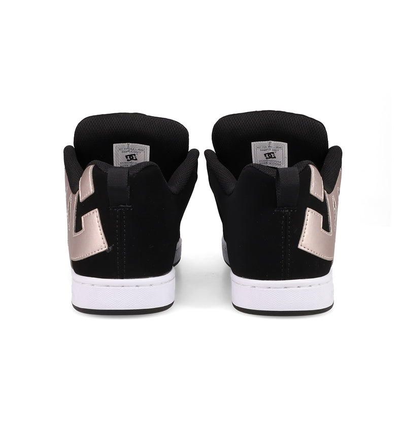 A pair of DC Shoes Women's Court Graffik sneakers with a puffy black silhouette, white soles, and metallic rose gold heel accents is shown from the back against a white background.