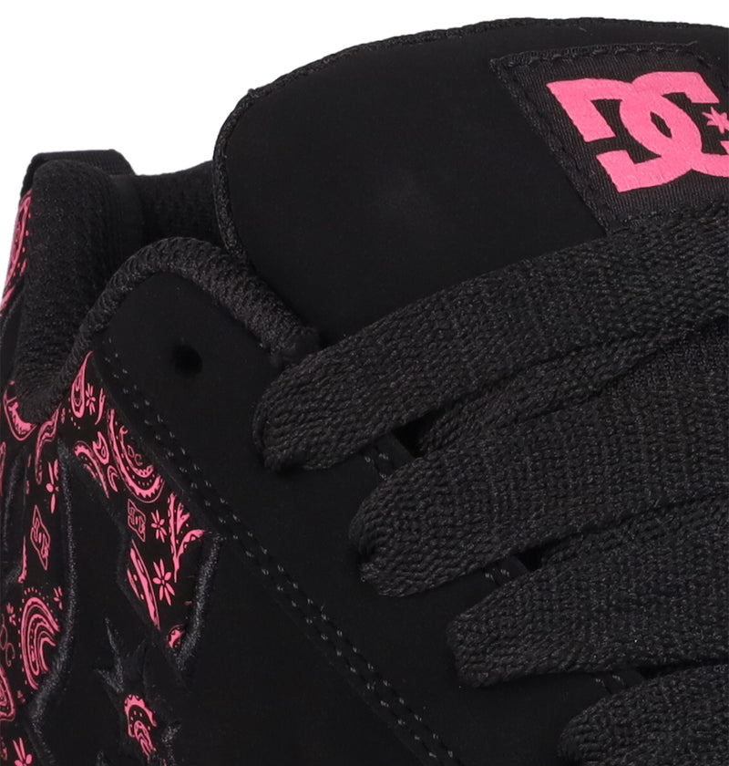 Close-up of DC Shoes' Women's Court Graffik sneaker in black with black laces, pink paisley print, and the DC logo on tongue and side, all in the classic puffy silhouette.