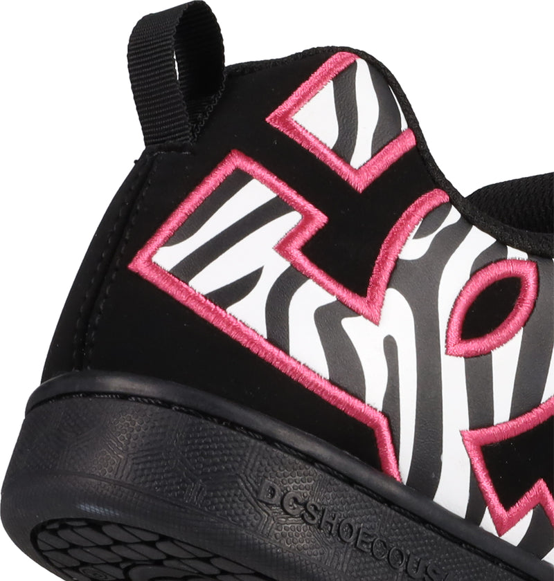 A close-up of the Women's Court Graffik Shoes by DC Shoes, featuring a puffy silhouette, black sole, zebra print in black and white, bold pink-outlined block letters, and a black pull tab at the heel.