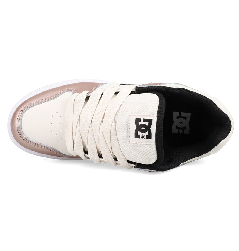 Top view of the Women's Manteca 4 Shoes by DC Shoes in beige and light pink, featuring cream laces, a black interior, and a tongue with the black and white DC Shoes logo for stylish comfort.