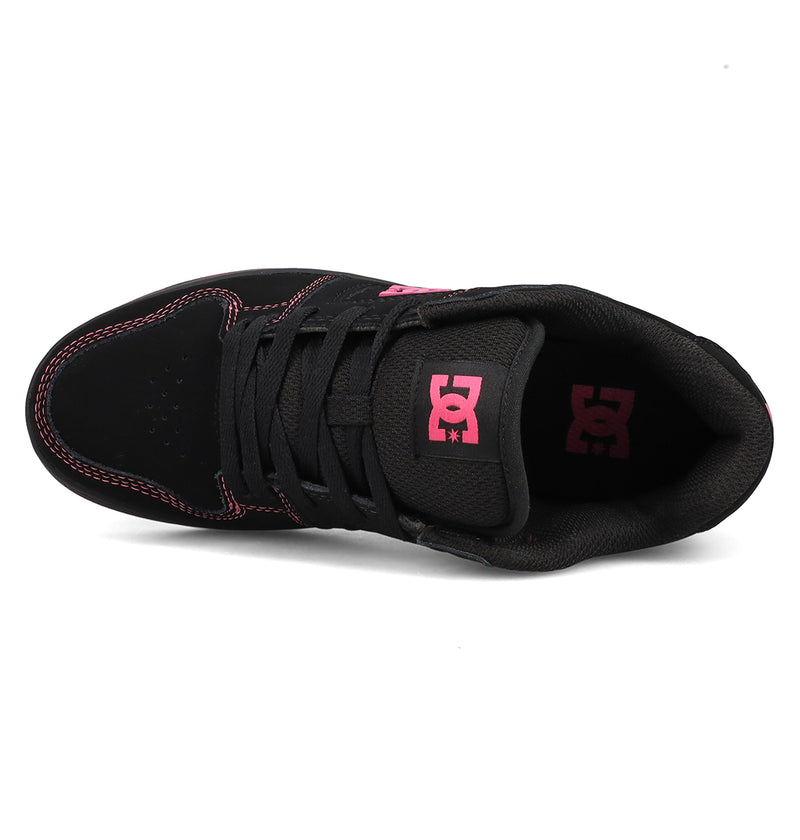 Top view of DC Shoes Women's Manteca 4: a black skate shoe with pink stitching, pink DC logos on tongue and side, black laces, padded collar, and suede-like material for a classic look.